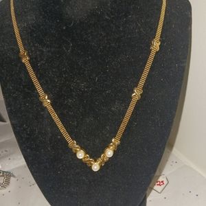 14K gold pearl 18" mesh chain.
